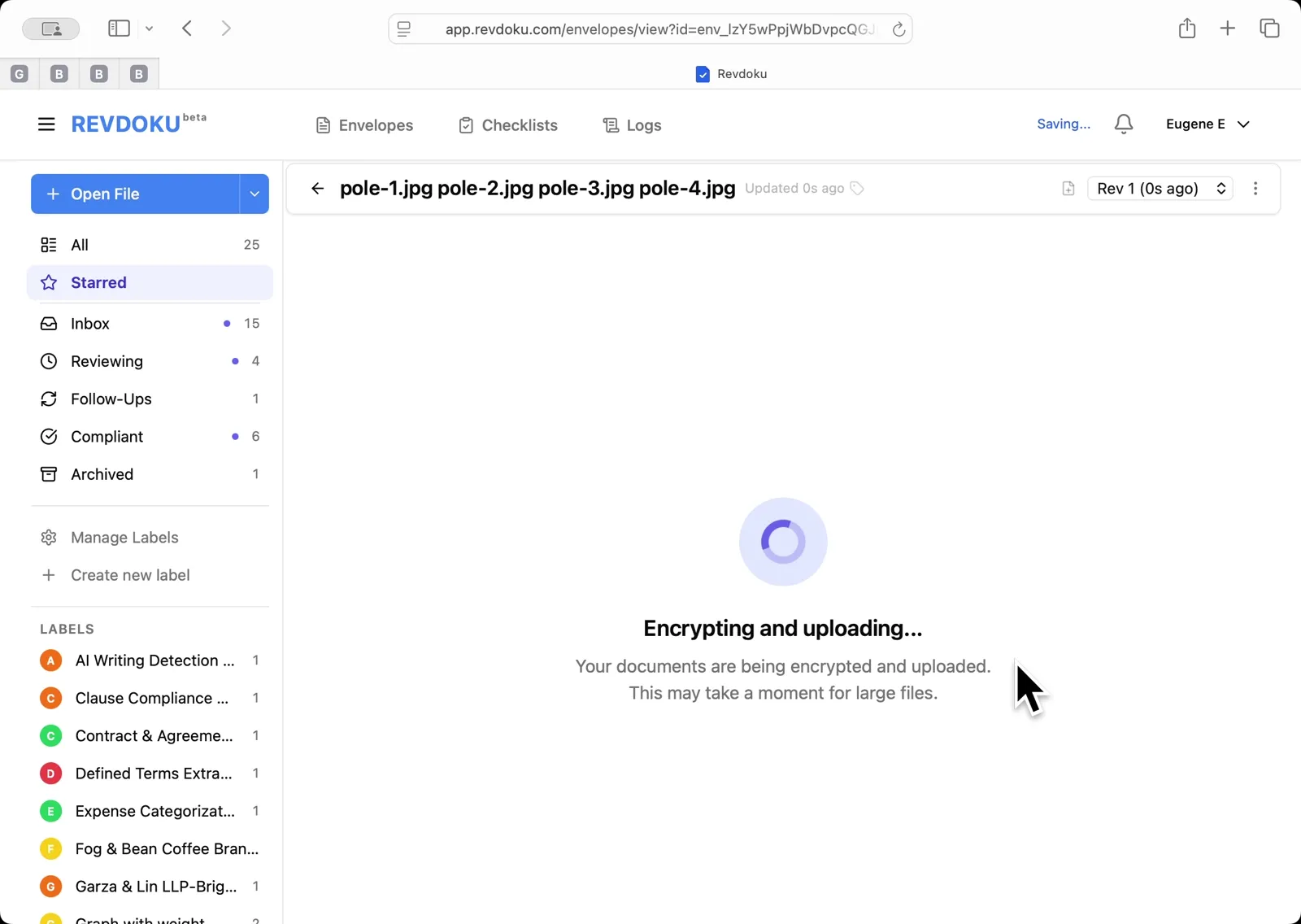 Wait for encryption and upload. Revdoku encrypts the files client-side and uploads them. The spinner reads Encrypting and uploading — this may take a moment for large image batches.